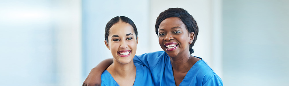 BOLD banner: two healthcare workers smiling