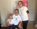 Melissa with her husband and daughter 