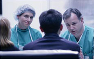 Image of doctors talking with patients