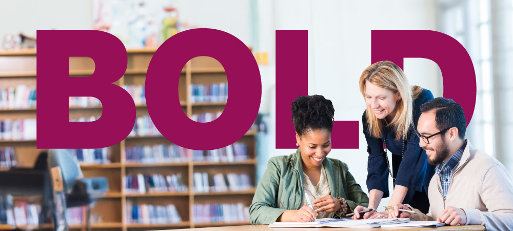 three people working on a group project