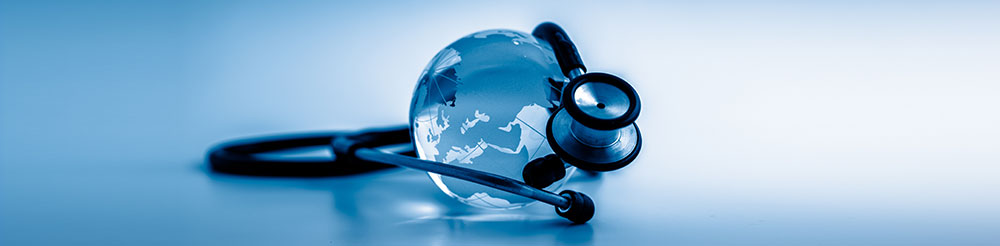 stethoscope wrapped around globe of the earth