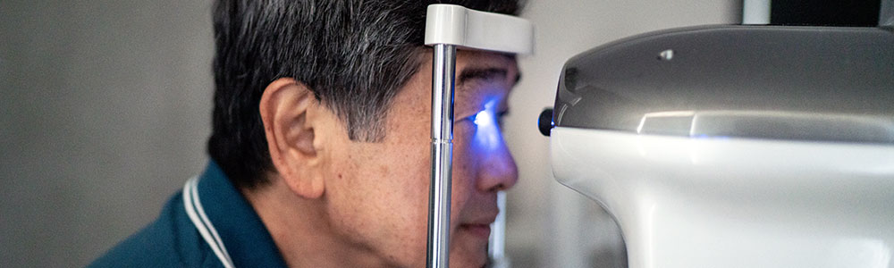 patient getting his eye scanned
