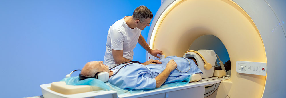 health professional preparing patient for MRI