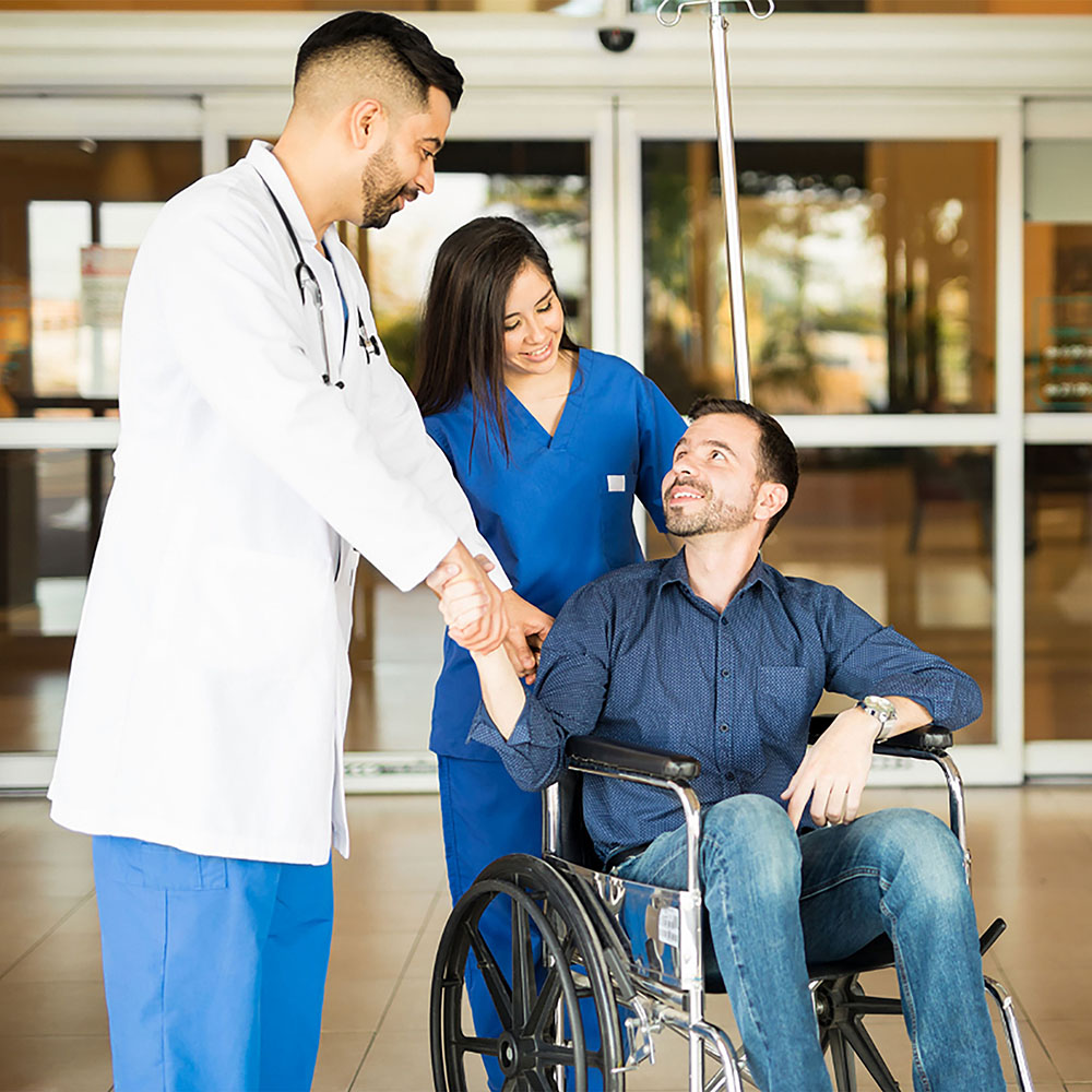 Doctor and patient in wheelchair