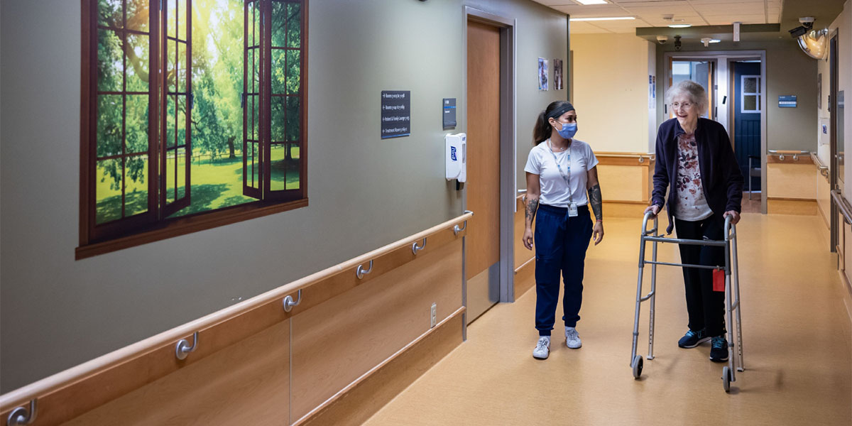 Patient walking the hallway