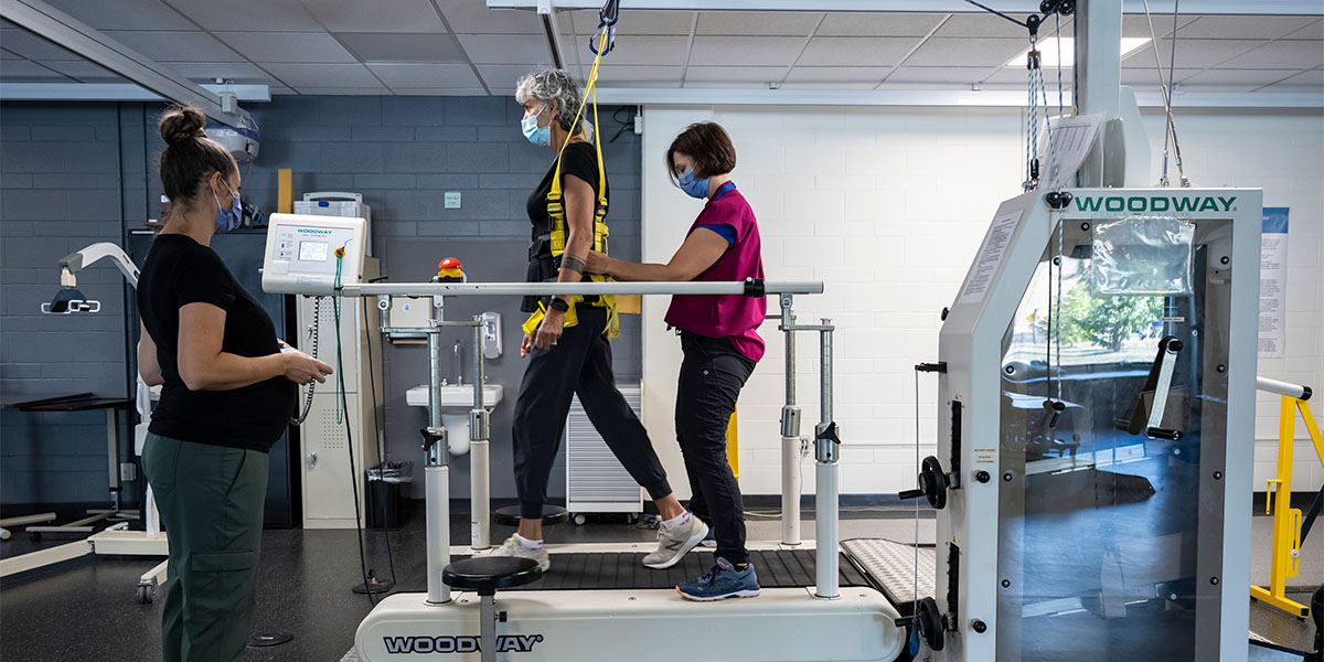 Woman walking on the treadmill