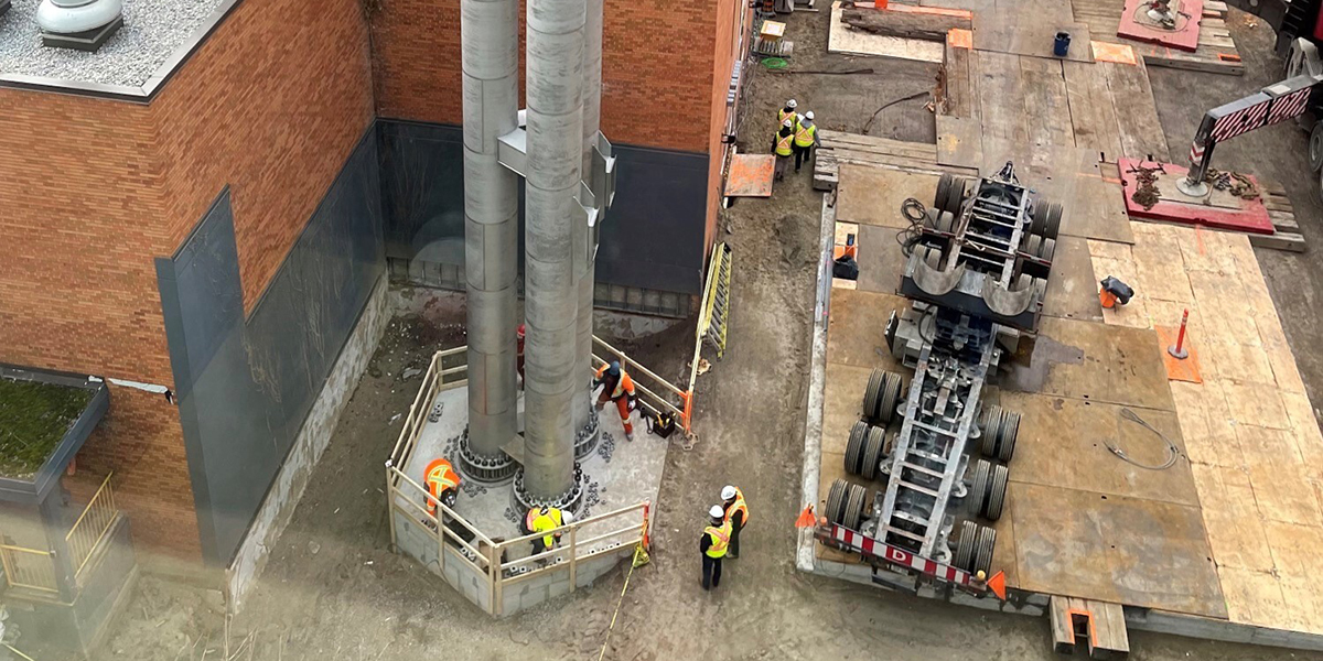 150-foot exhaust stack secured in place