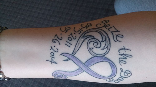 Kristy-Lynn proudly displays her tattoo
