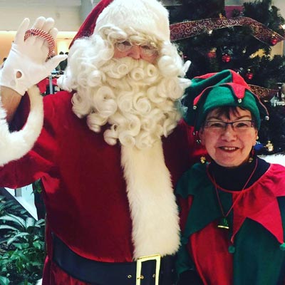 Barb as elf with Santa 