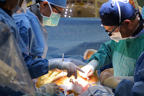 Image of cardiac surgeons performing surgery