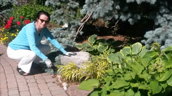 Image of Justine Jackson gardening at home