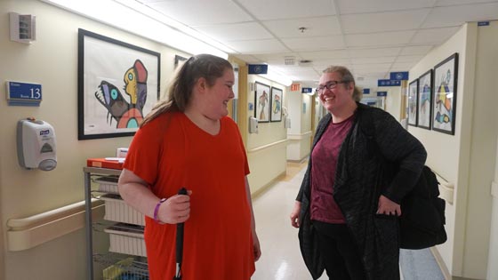 Rachel and her mom in hospital hallway 