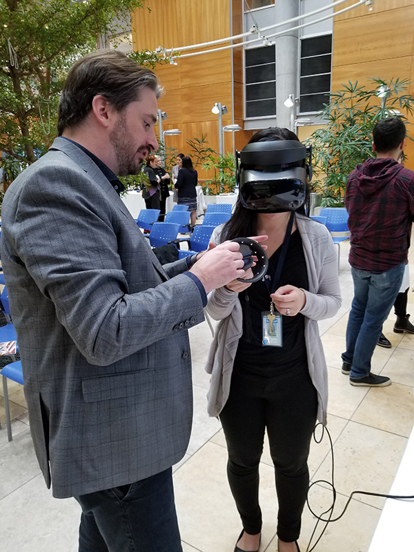 Man with woman in VR simulator 