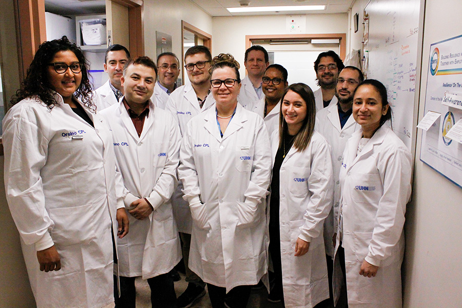 Team photo in lab coats