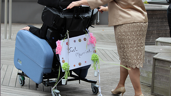 Catherine Dirks, an occupational therapist, decorated the groom's wheelchair