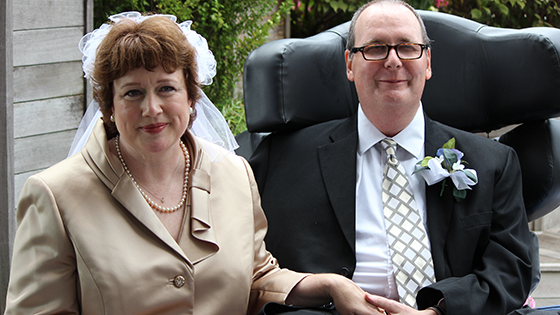 Dawn Richards and Greg Berghofer, a patient on the palliative care unit, pose after being married on Princess Margaret's rooftop