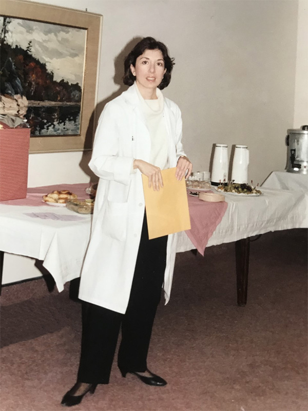 Susan in lab coat