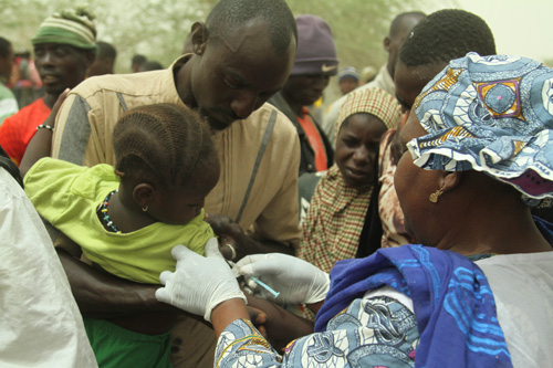 Image of child receiving a measles vaccine as part of this campaign