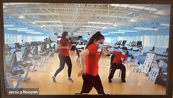 Screenshot of 3 people in gym 