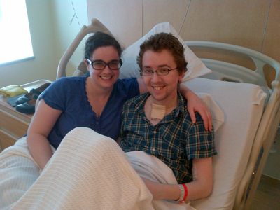 James and Adena Reimer pose in James’ hospital room on July 19, 2012 