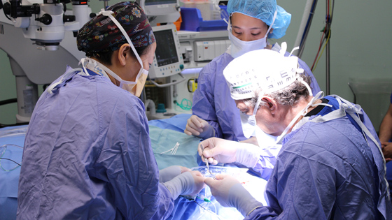Image of Dr. Robert Devenyi (right) and his surgical team 