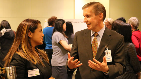 Dr. Pisters chats with staff at PVP open house 