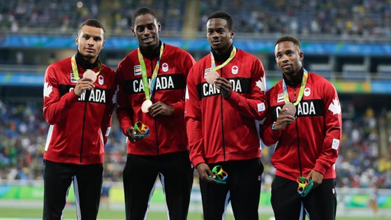 Canadian 4 x 100 m relay team show off medals 