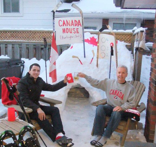 Stuart Craig (left), and her dad, Rick Craig (right), showing their Olympic pride