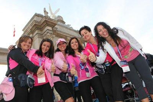 Women in pink giving thumbs up image