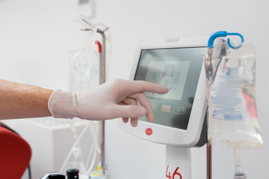 Stock image of medical professional using equipment