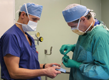Dr. Michael Fehlings prepares the first stem cell injection