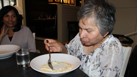Image of Dorothy Dass enjoys her celebratory meal 