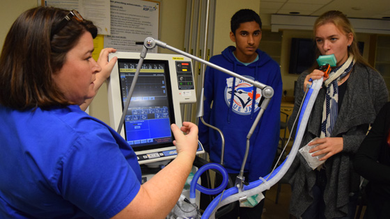 Image of Grade 9 student Emma breathes using a ventilator in respiratory therapy 
