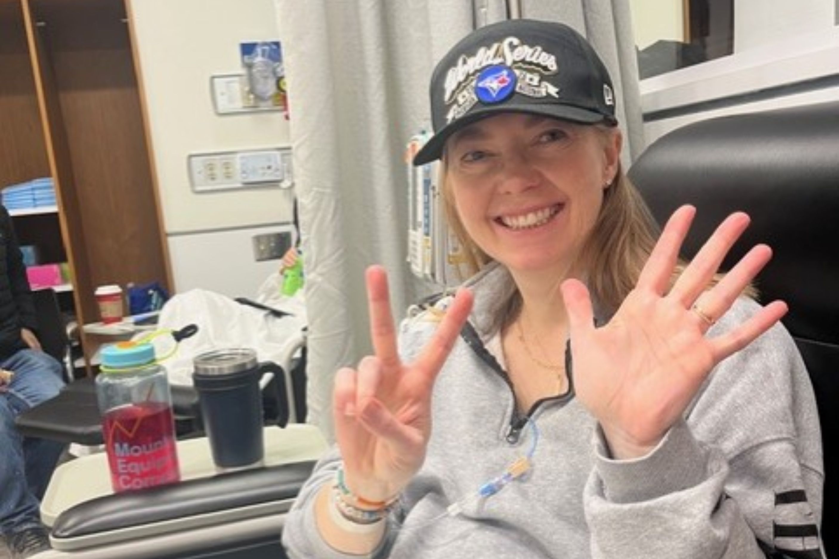 Ashley and Dave at the hospital ringing the bell after chemo