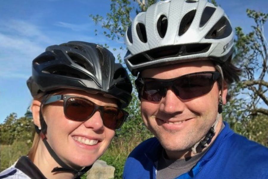 Ashley and Dave with cycling helmets