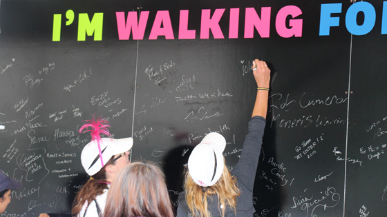 Image of Participants had the opportunity to sign a board signifying who their walk was for