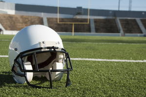 Helmet in football field image