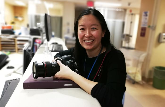 Dr. Lim with camera in ER
