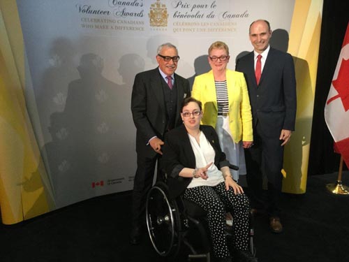 Image of Jessica Coriat, with parents and The Honourable Jean-Yves Duclos